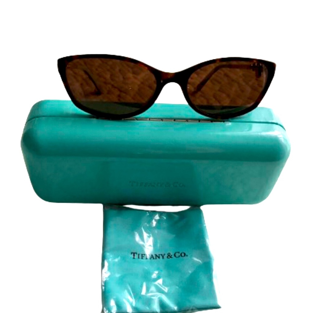 Woman’s Tiffany sunglasses,  hard case & cleaning cloth EUC see video & …
